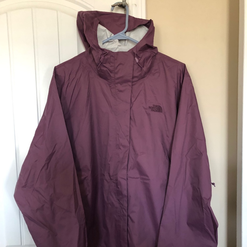 Purple never worn north face jacket.